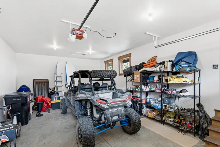 Garage featuring a garage door opener
