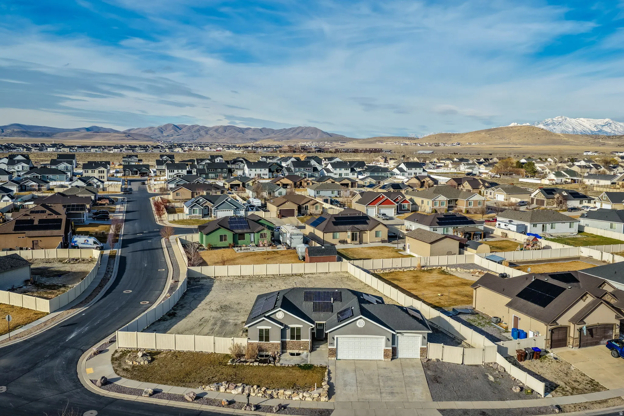 Aerial view of residential area with a mountain backdrop