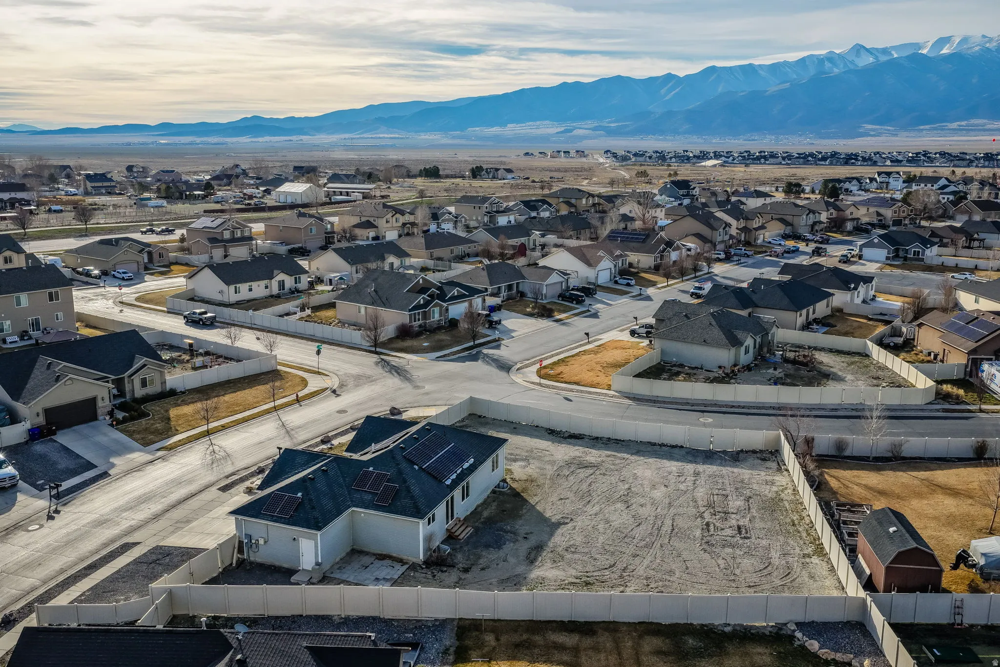 Aerial perspective of suburban area featuring mountains