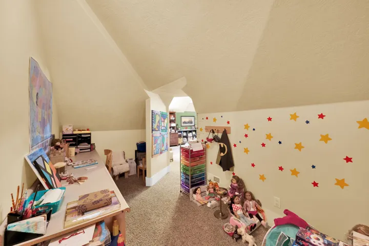 Game room featuring carpet flooring and baseboards