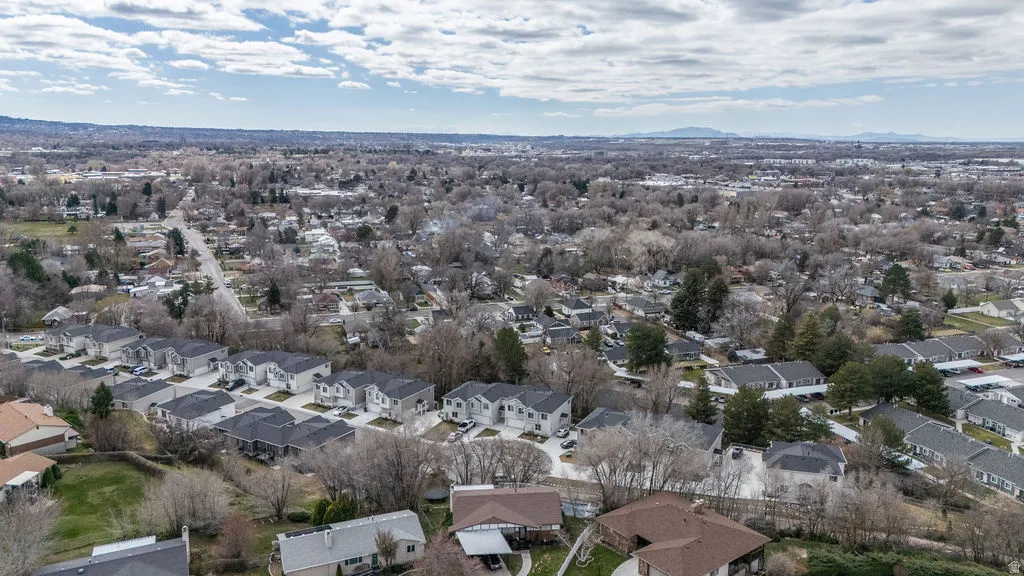Aerial view of residential area featuring mountains