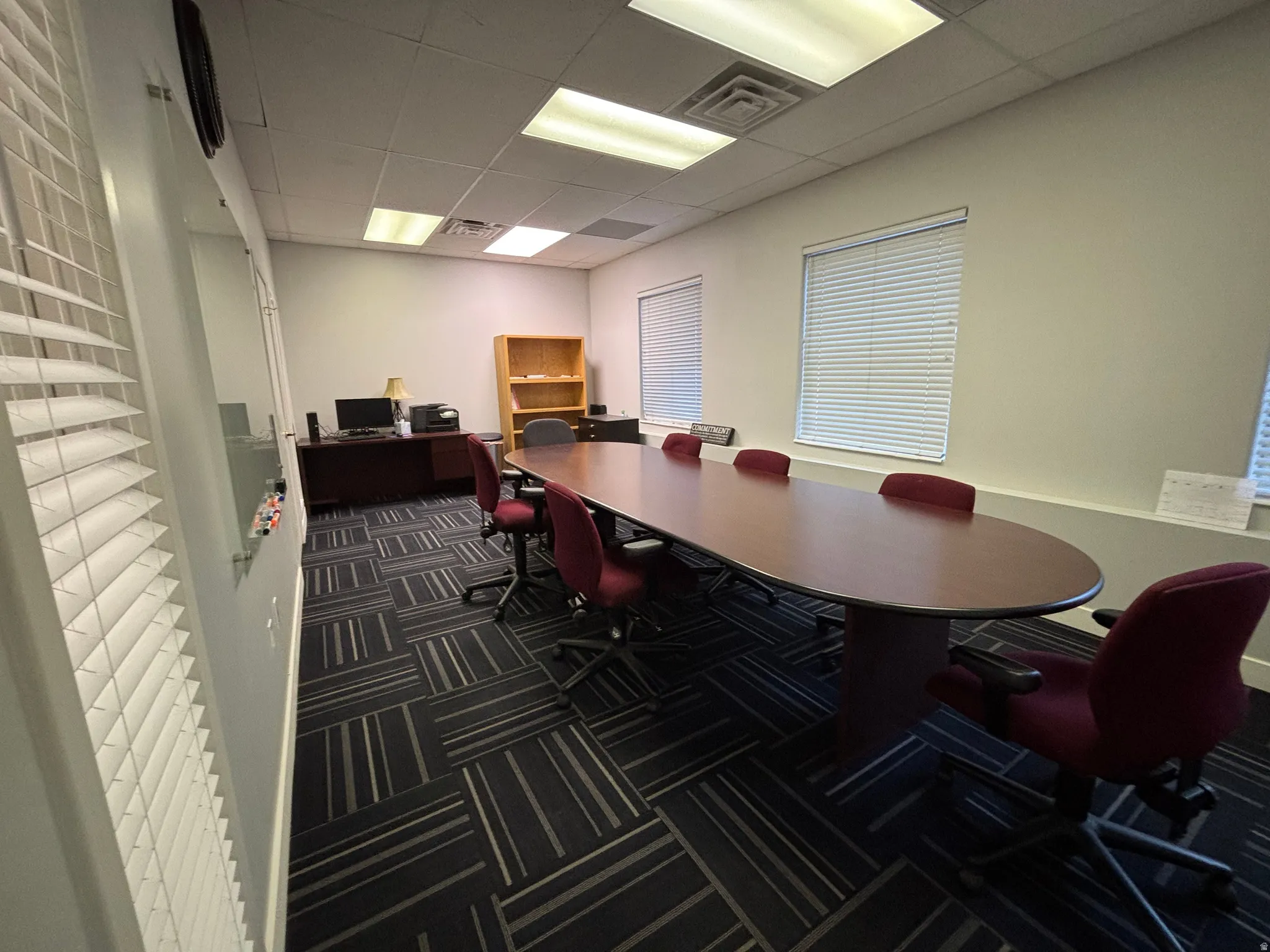 Home office featuring a paneled ceiling