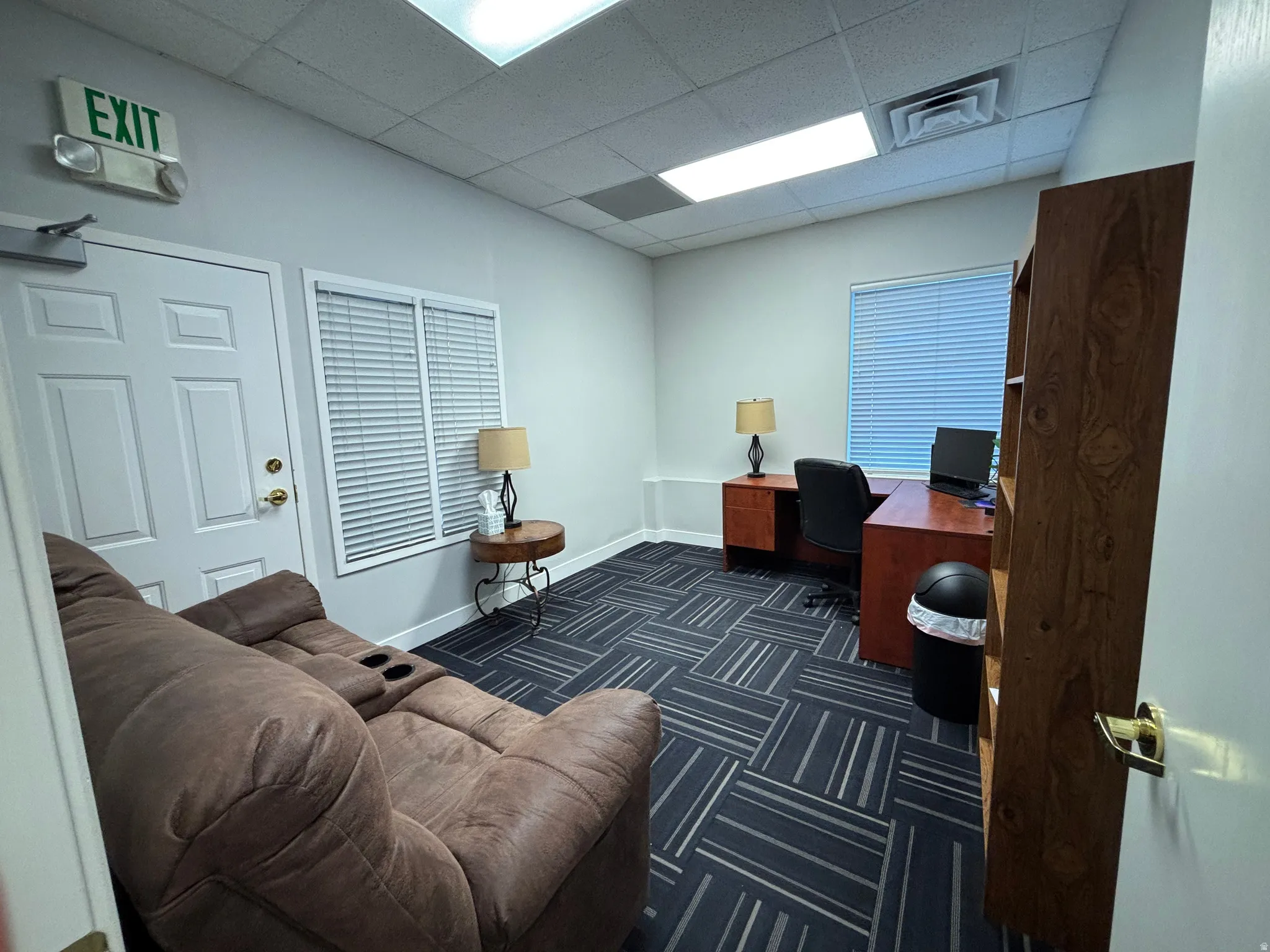 Office space featuring a paneled ceiling