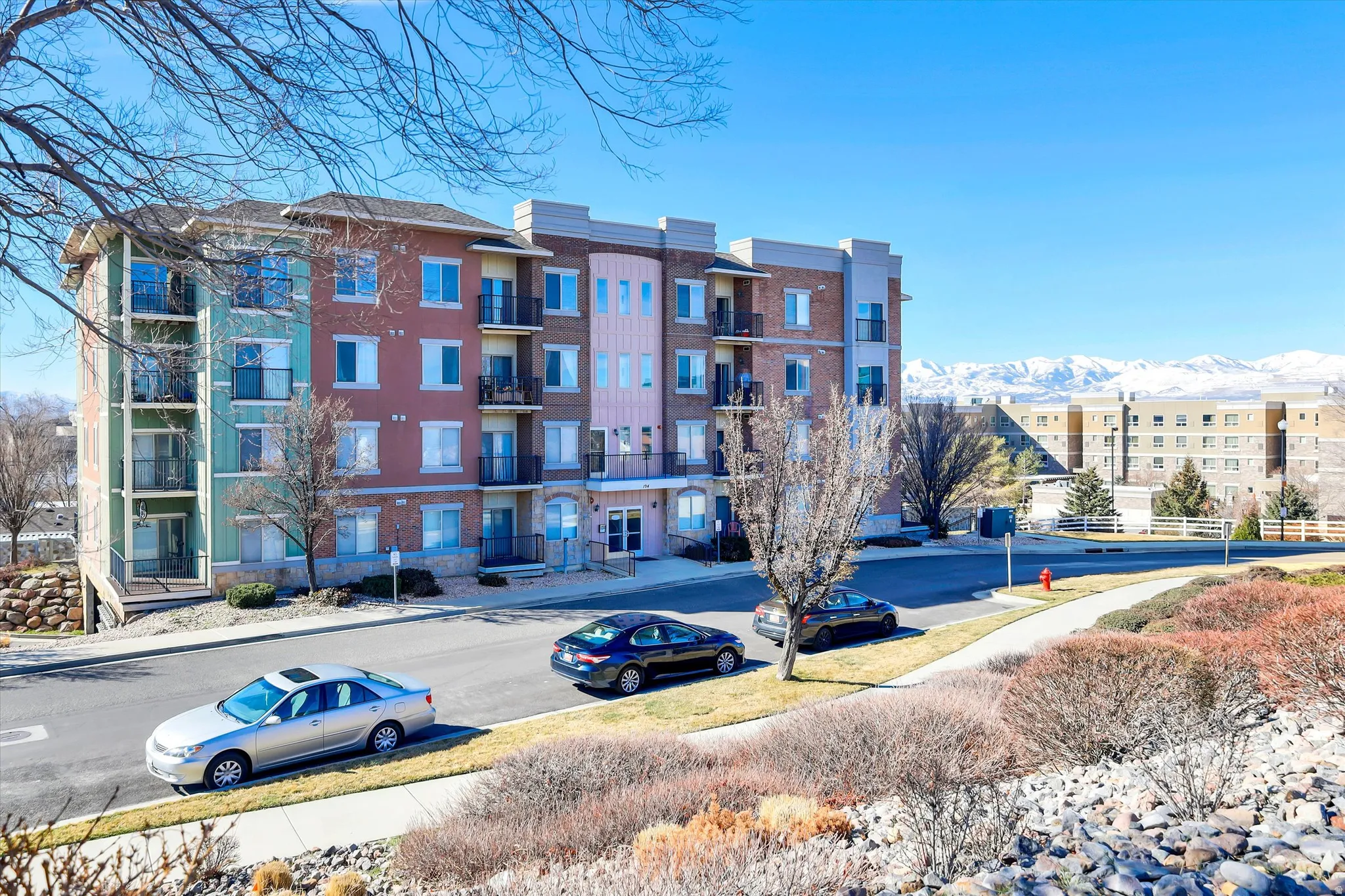 View of apartment building / complex with a mountain view