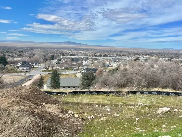 Aerial view of residential area with mountains