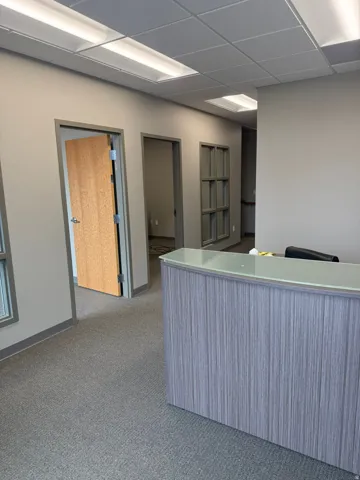 Home office with a drop ceiling