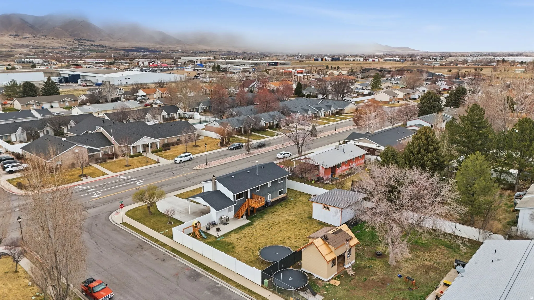 Aerial view of residential area with mountains