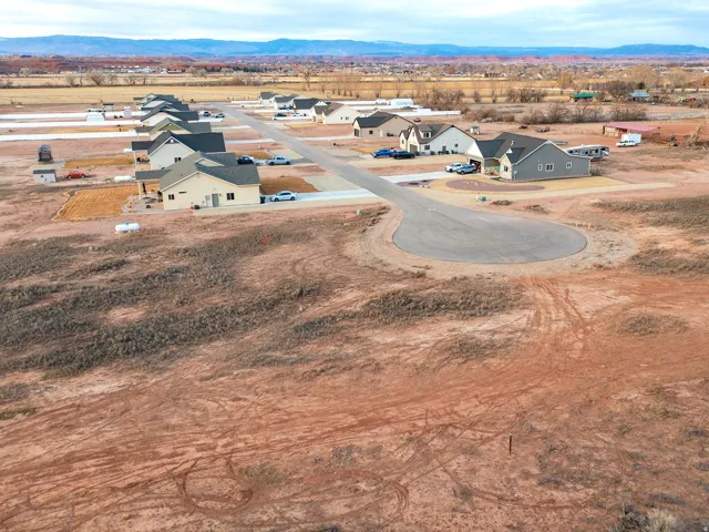 Aerial perspective of suburban area with mountains