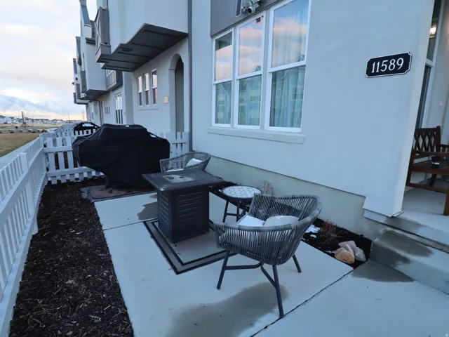 View of patio featuring a mountain view and a grill
