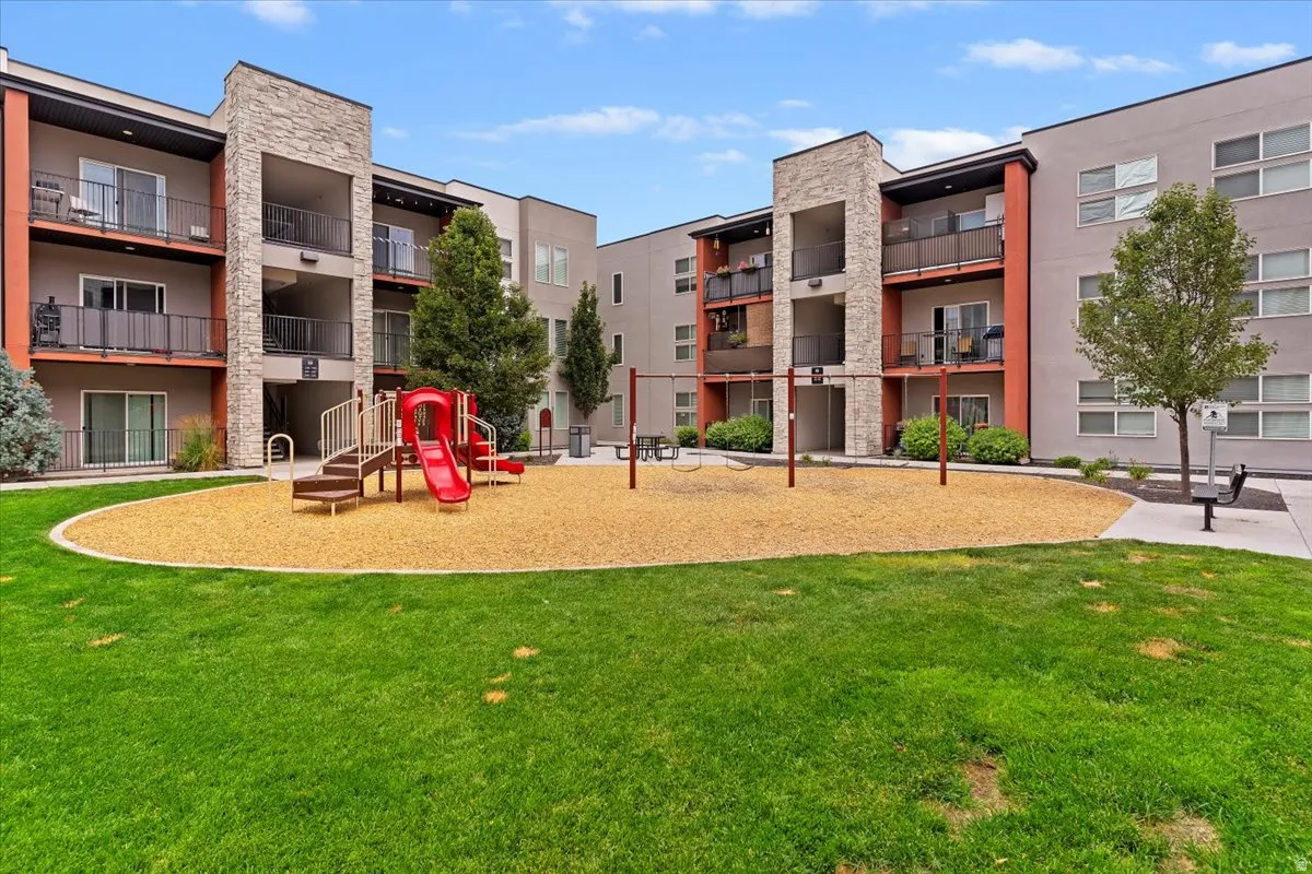 Communal playground featuring a yard