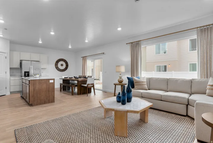 Living room featuring recessed lighting and light wood-style flooring