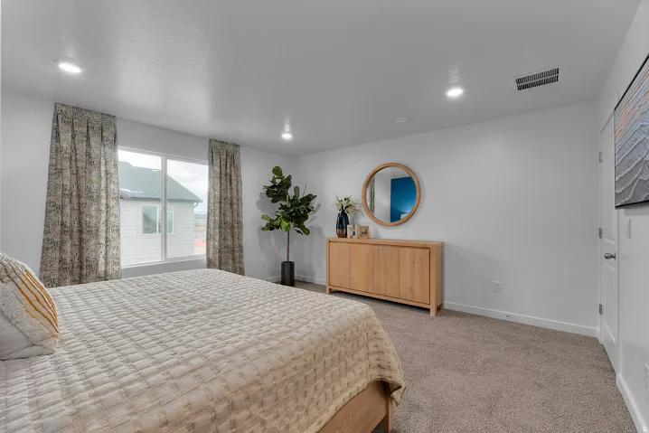 Bedroom featuring recessed lighting and carpet flooring