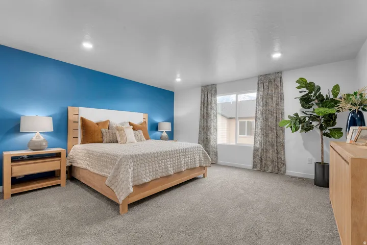 Carpeted bedroom featuring recessed lighting