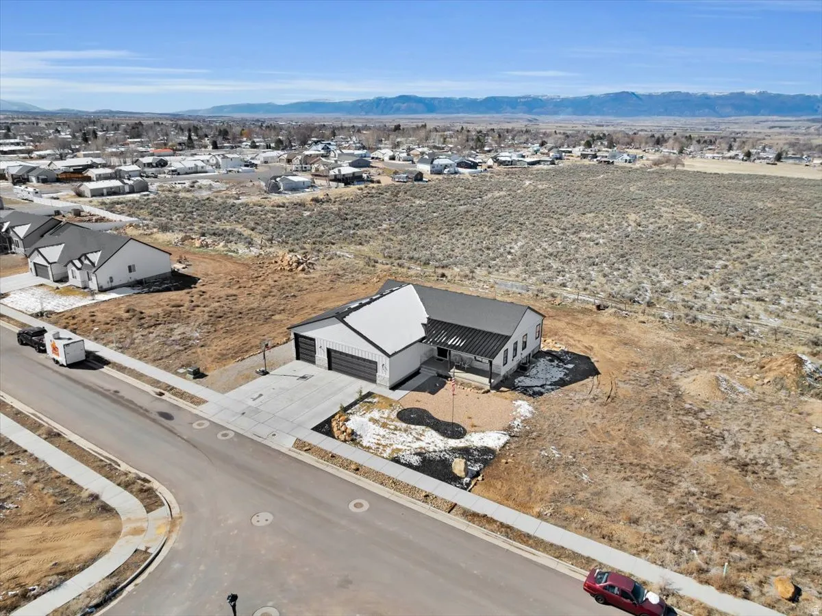 Aerial perspective of suburban area featuring mountains