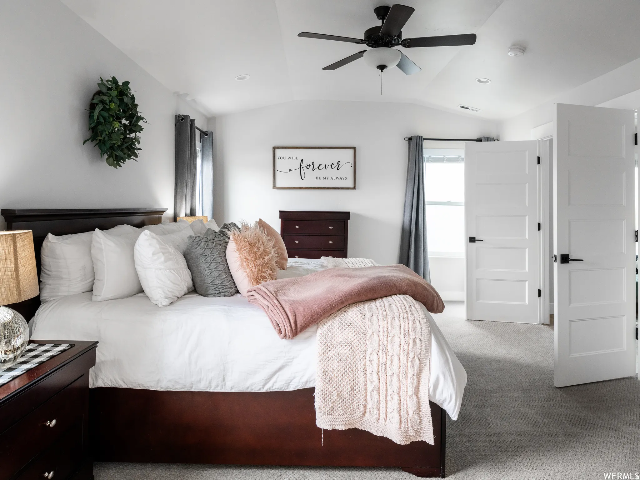 Bedroom with lofted ceiling, carpet, recessed lighting, and a ceiling fan