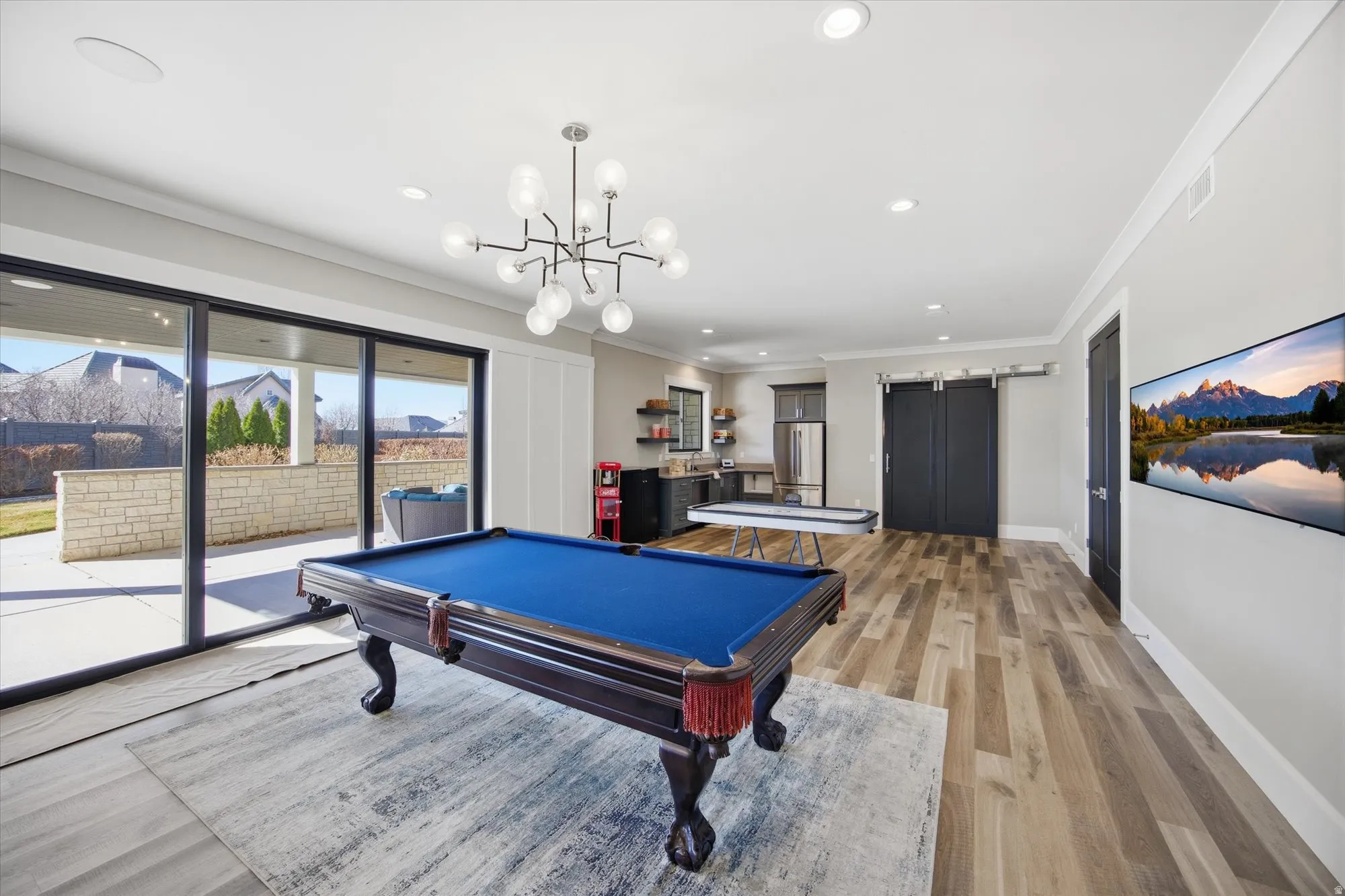 Playroom featuring light wood-style flooring, ornamental molding, pool table, and recessed lighting