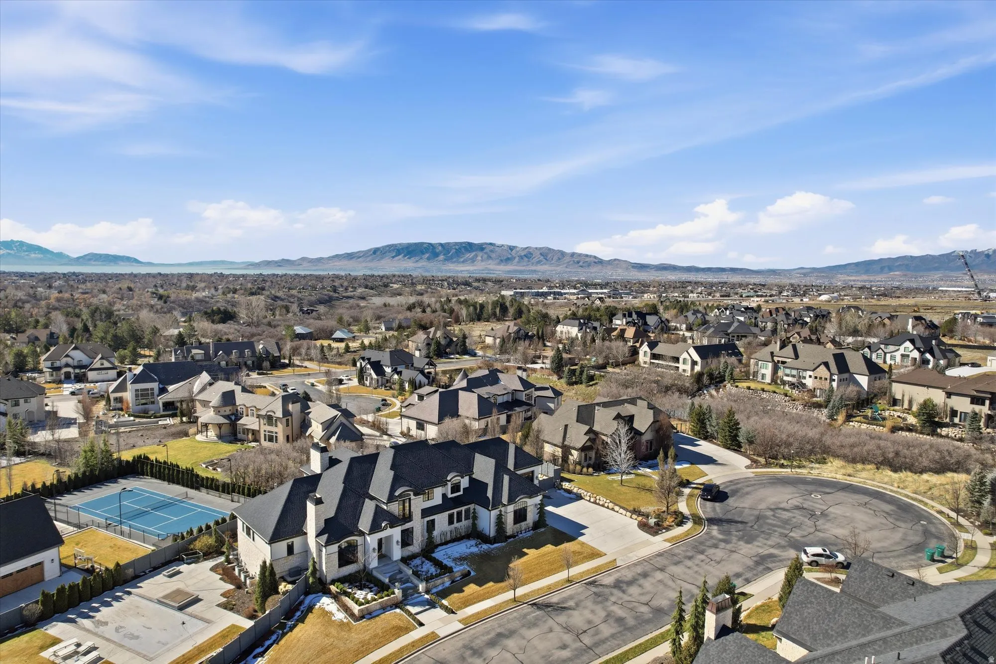 Aerial view of residential area with a mountain backdrop
