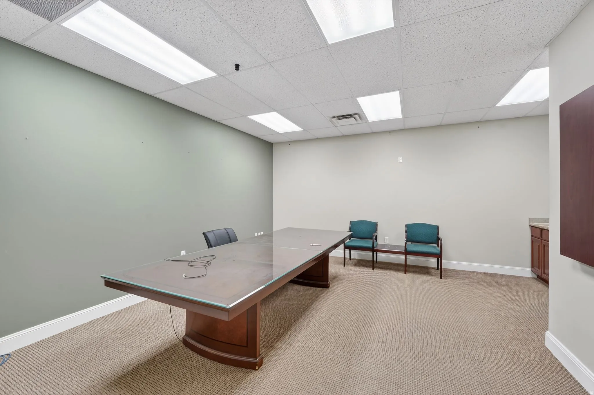 Office featuring a paneled ceiling
