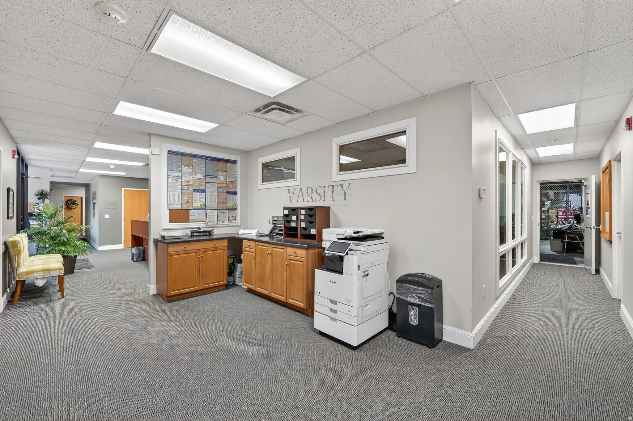 Home office featuring a drop ceiling