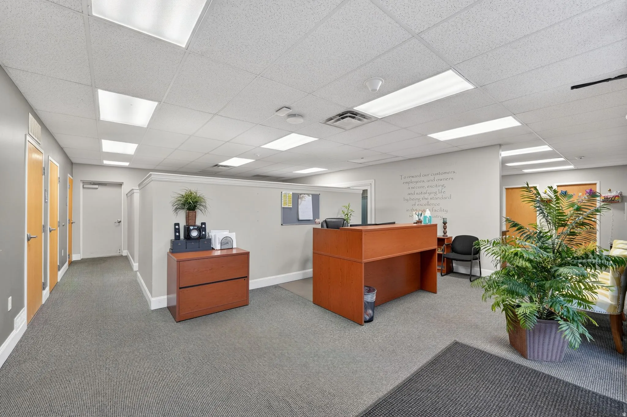 Office space featuring a paneled ceiling