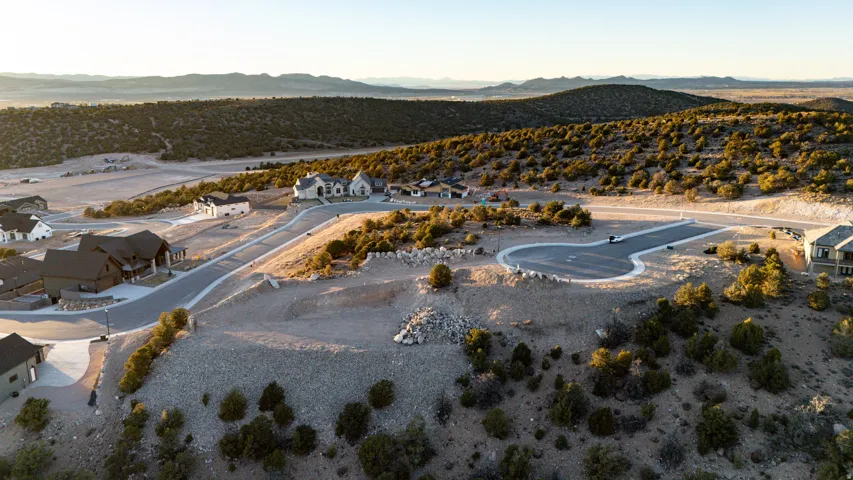 Bird's eye view of a mountainous background and a desert landscape