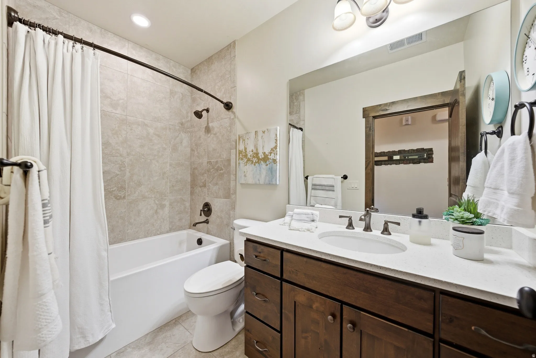 Full Bathroom featuring vanity, shower / tub