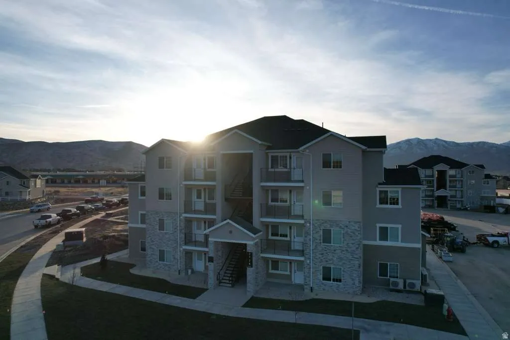 View of apartment building / complex with a mountain view