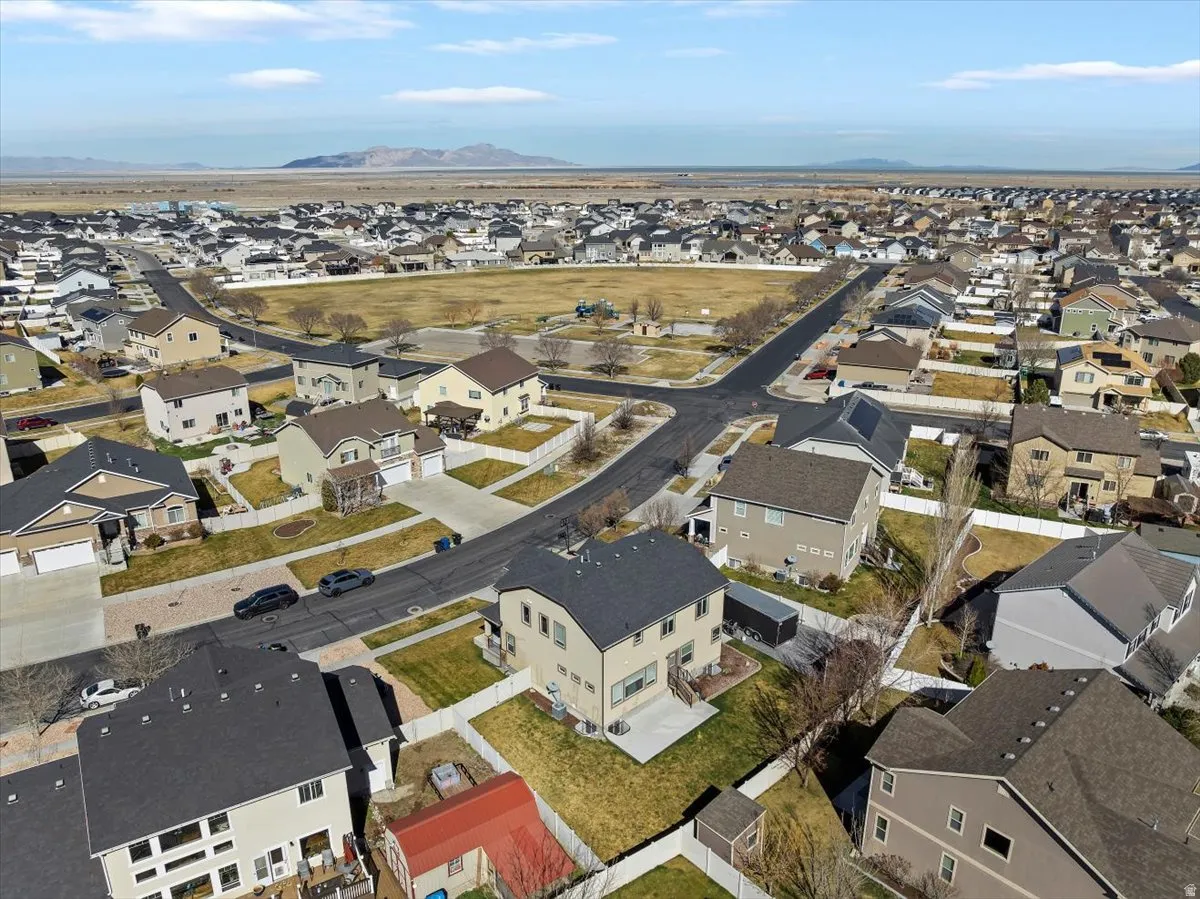 View of property location with nearby suburban area