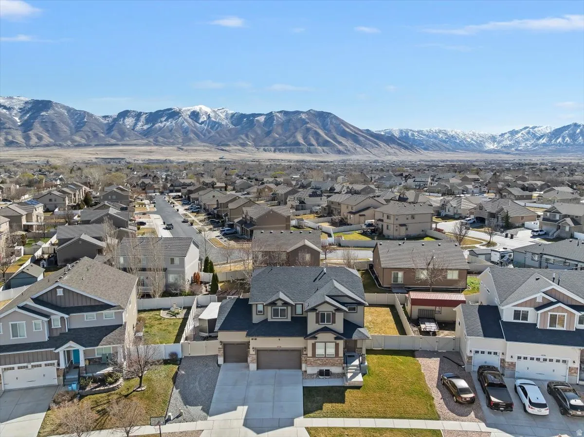 Aerial view of residential area with a mountain backdrop