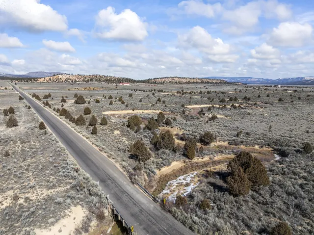View of mountain backdrop featuring a desert landscape and rural landscape