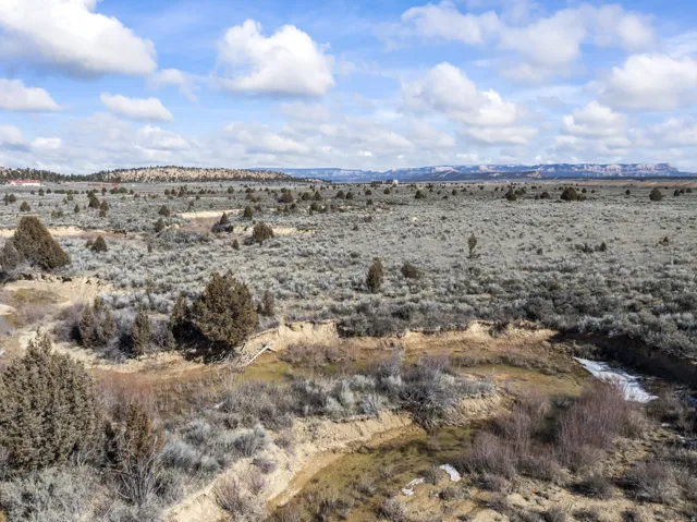 View of mountain backdrop featuring rural landscape and a desert landscape