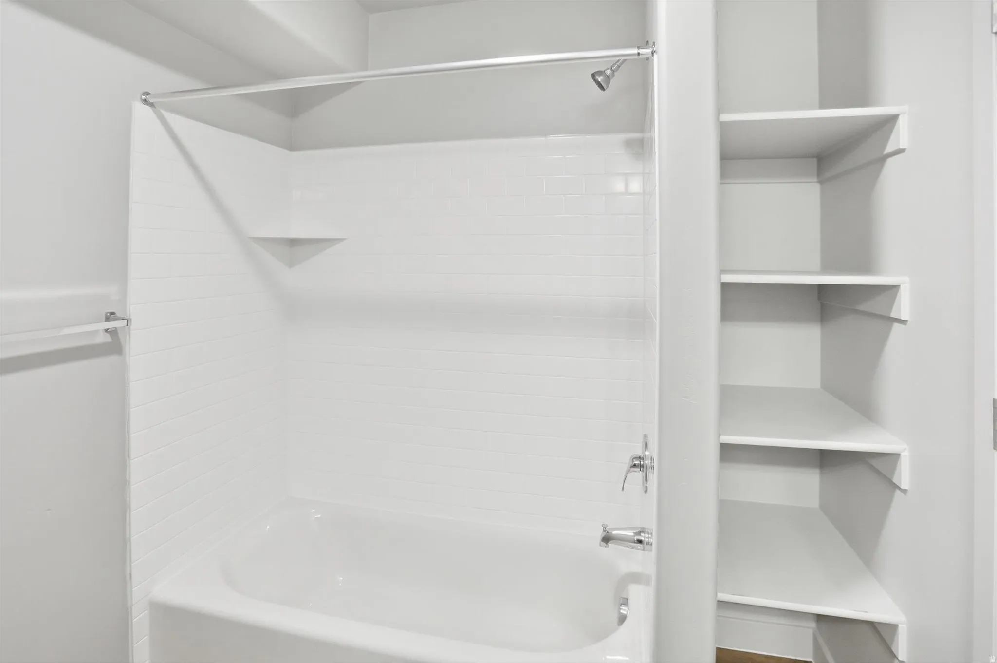 Full bath with shower / tub combination and a closet