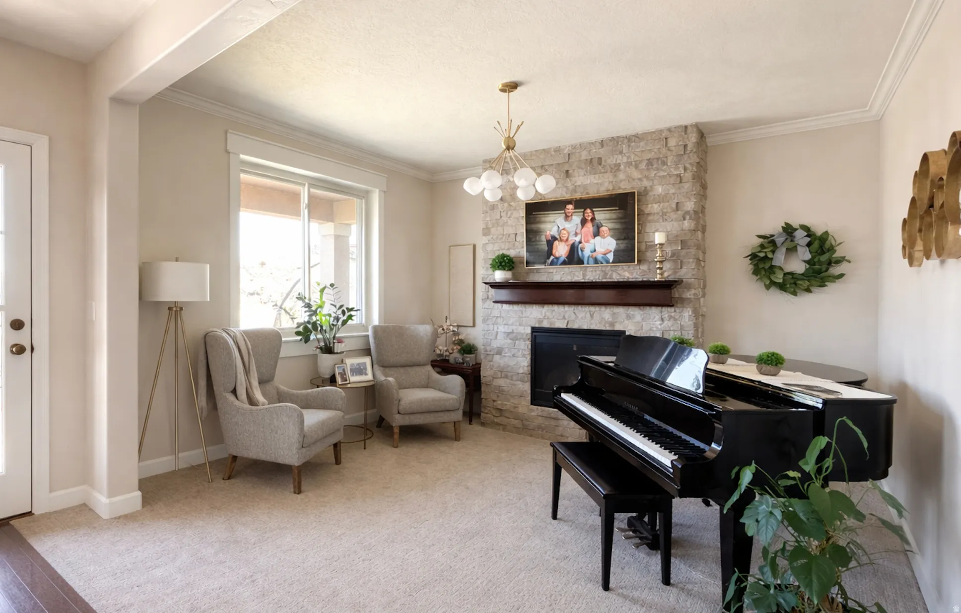 Sitting room featuring crown molding, light carpet, and a fireplace
