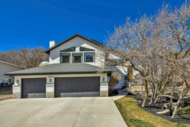 East Facing Home with Terraced Yard and Mountain Views