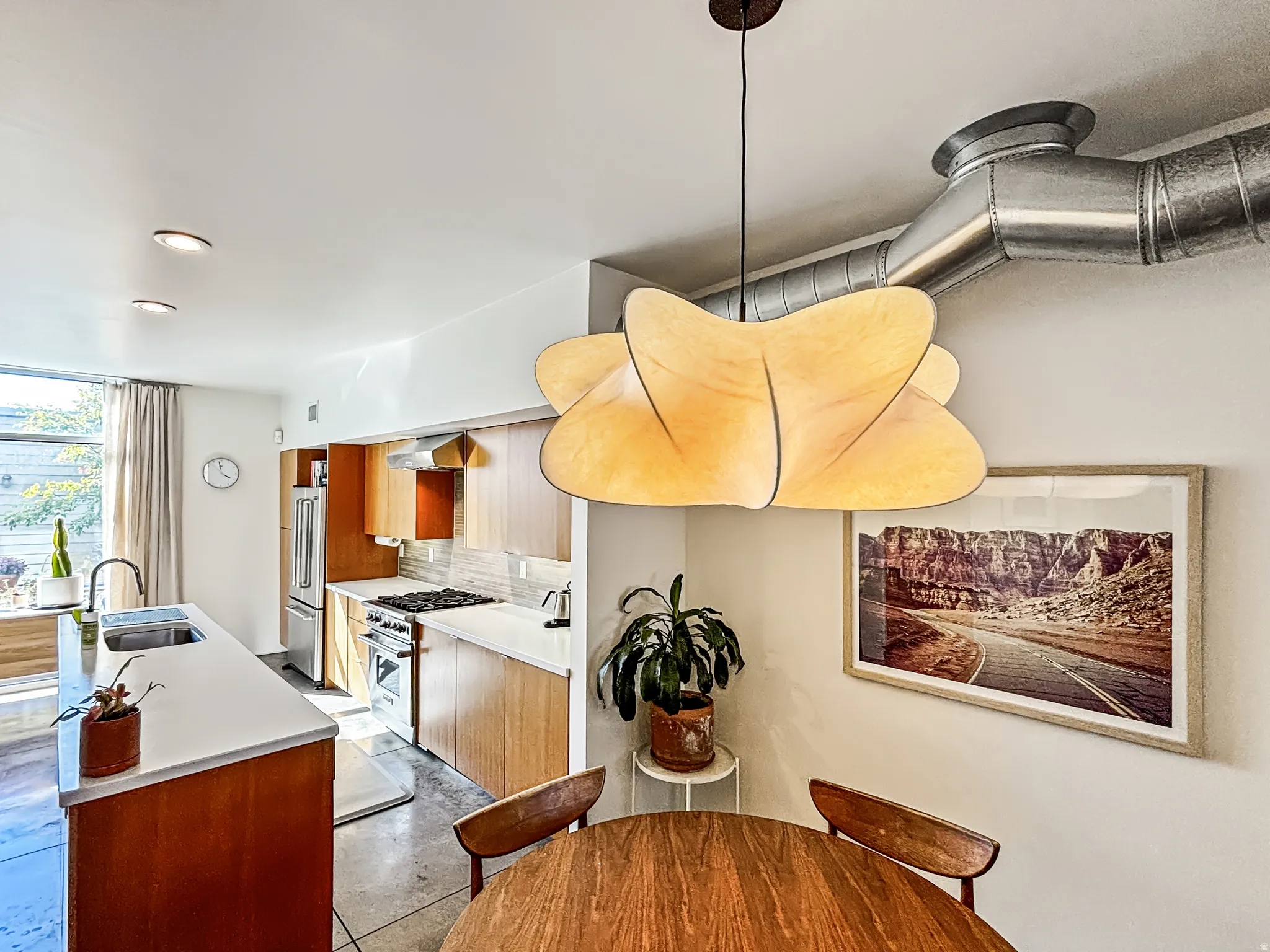 Dining space featuring recessed lighting