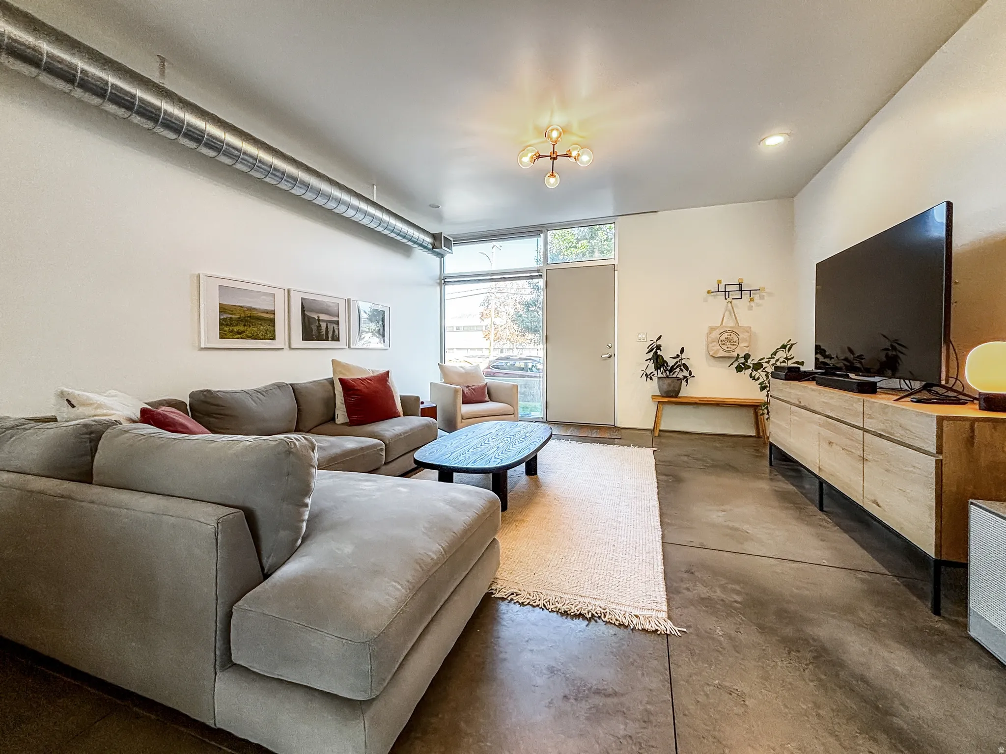 Living room with finished concrete floors