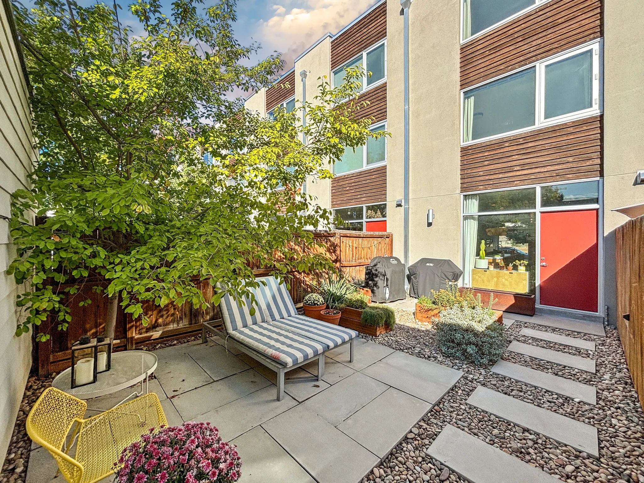 Fenced backyard featuring a patio