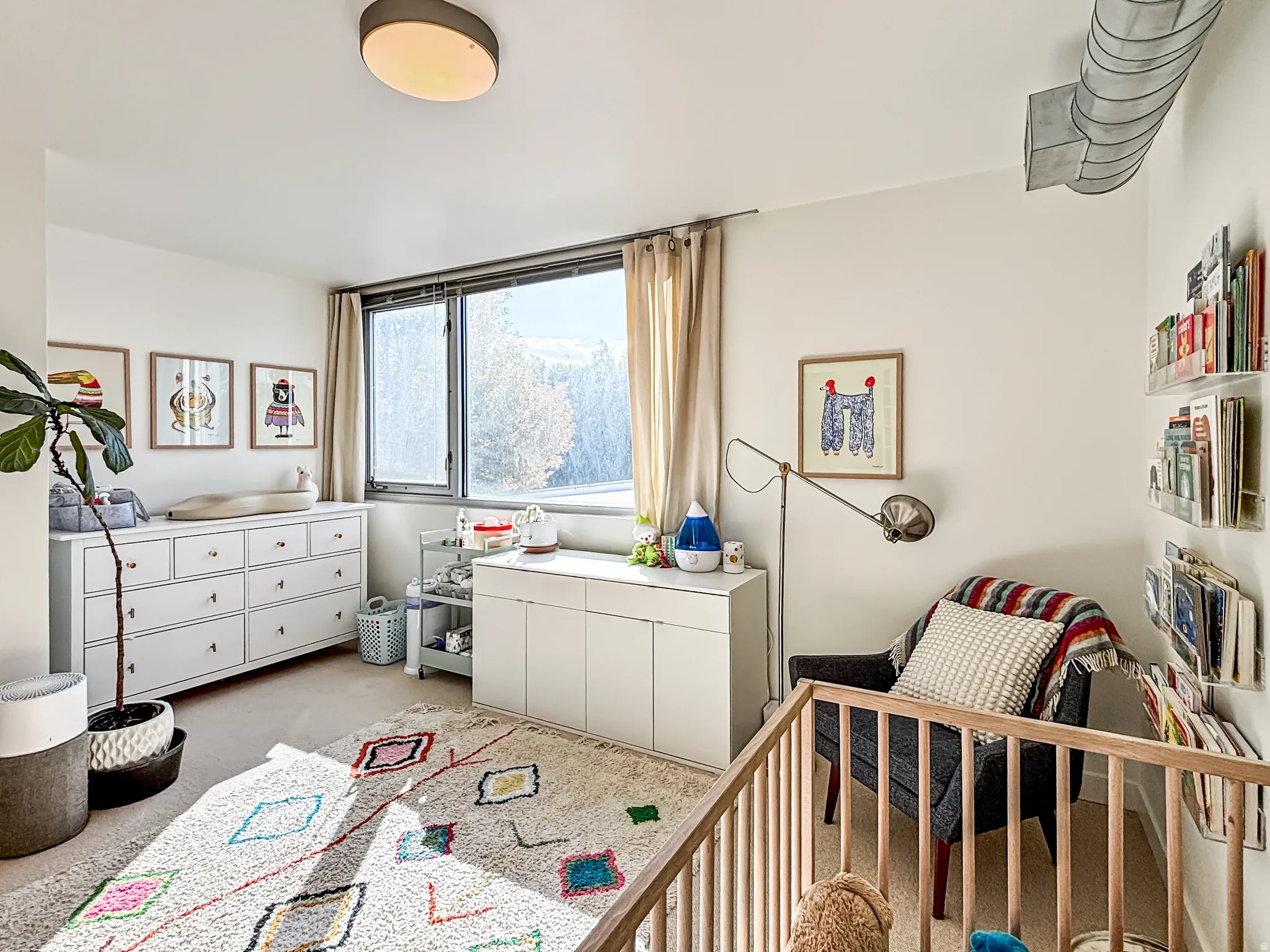 Bedroom with light carpet