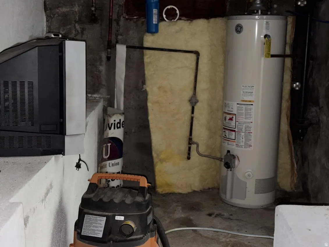 Utility room with gas water heater