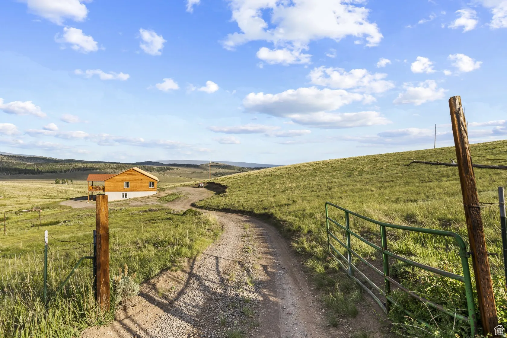 View of yard featuring a view of rural / pastoral area and a mountain view