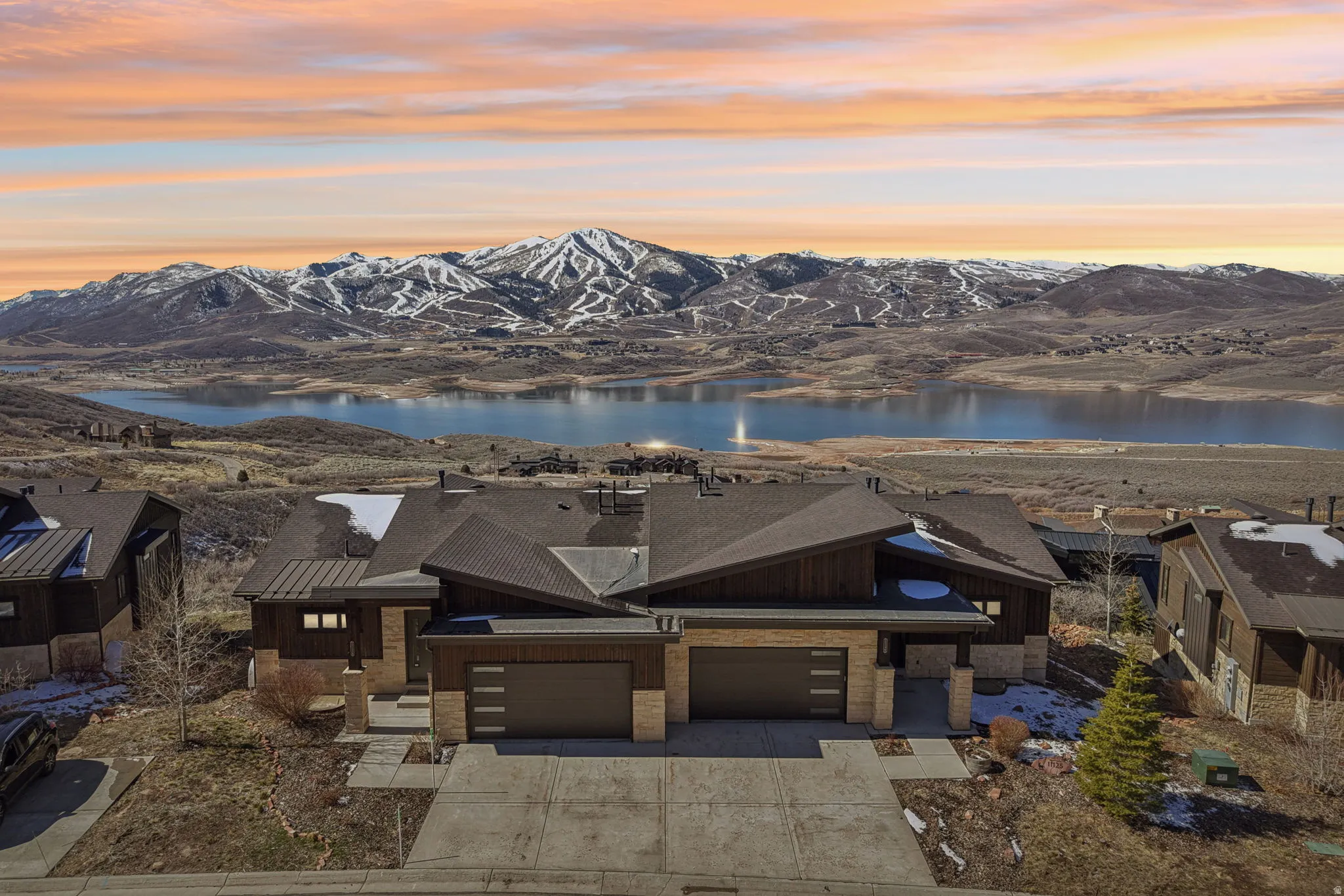 Aerial view at dusk of a water and mountain view