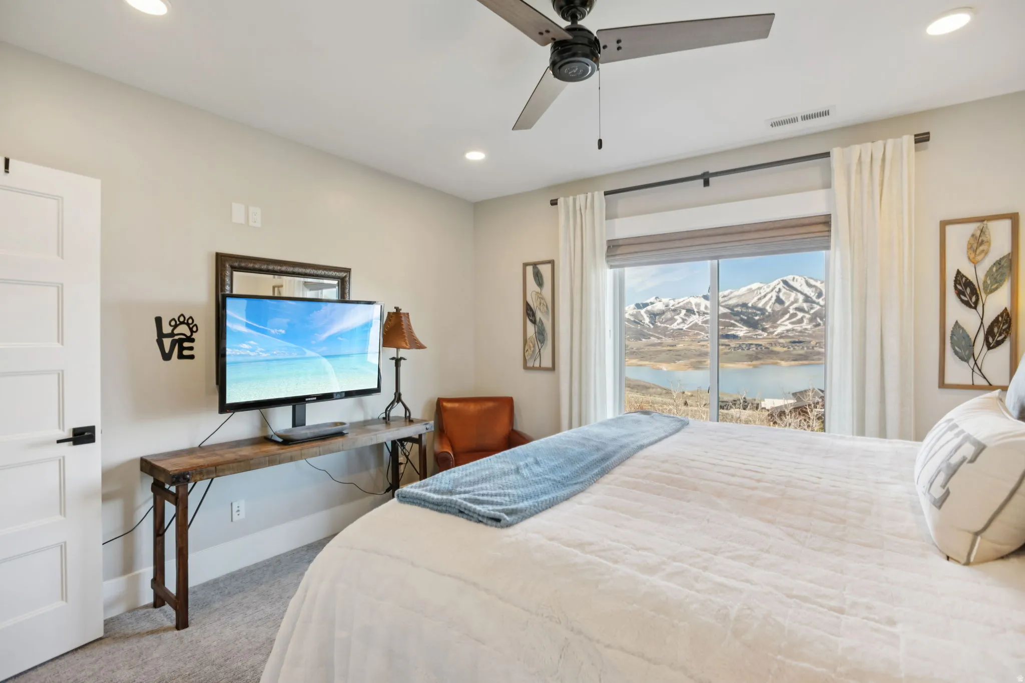 Bedroom with light carpet, recessed lighting, a ceiling fan, and access to outside