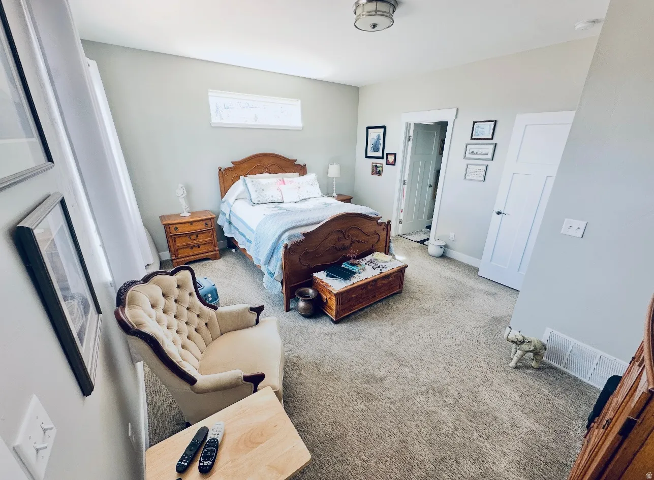 View of carpeted bedroom