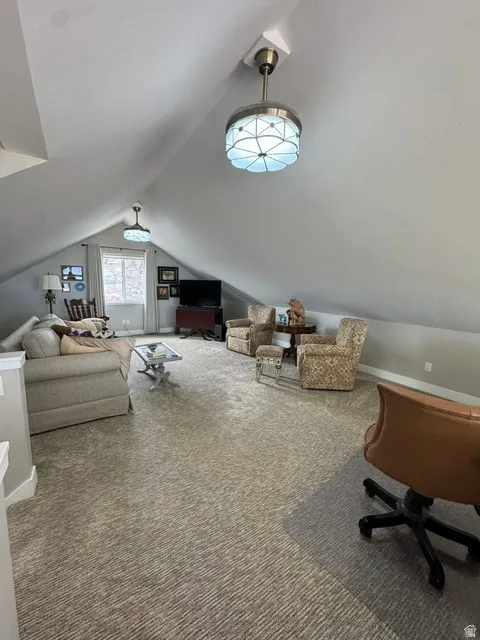 Living room with carpet and a desk
