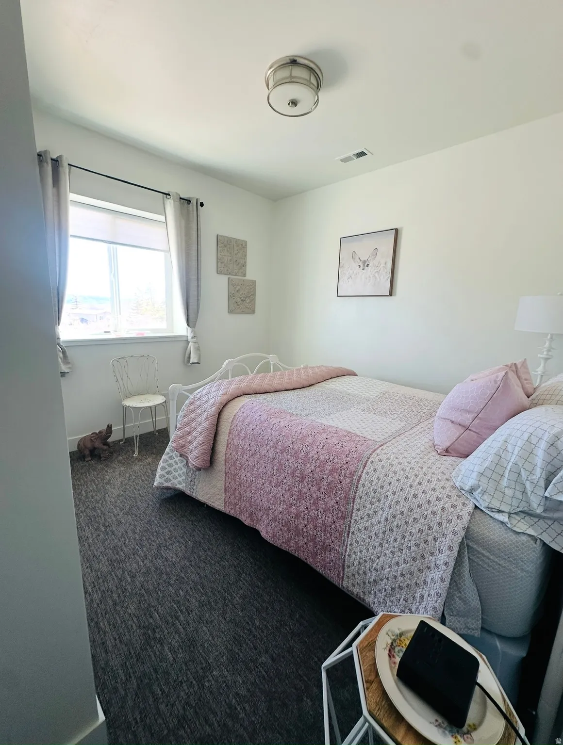 Bedroom featuring carpet floors
