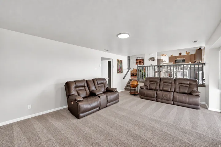 Carpeted lower level with recessed lighting