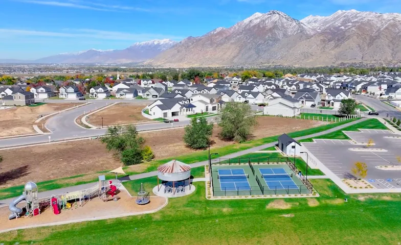 View of mountain backdrop with nearby suburban area