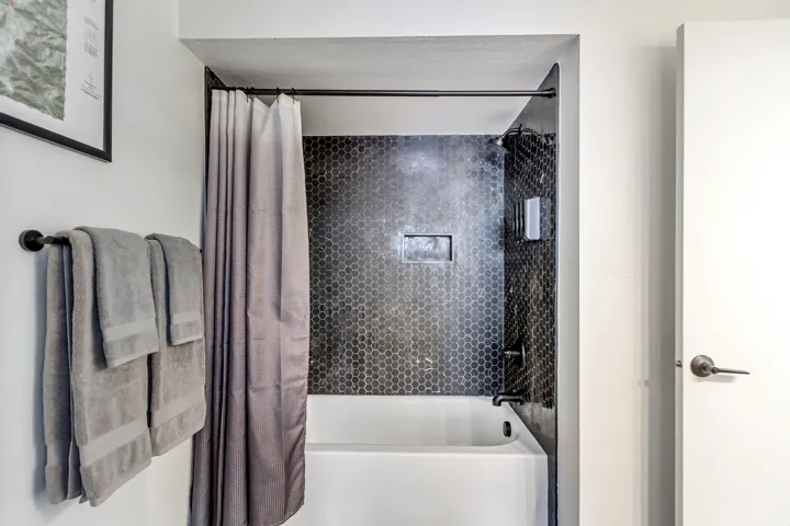 Full bath featuring shower / bathtub combination with curtain