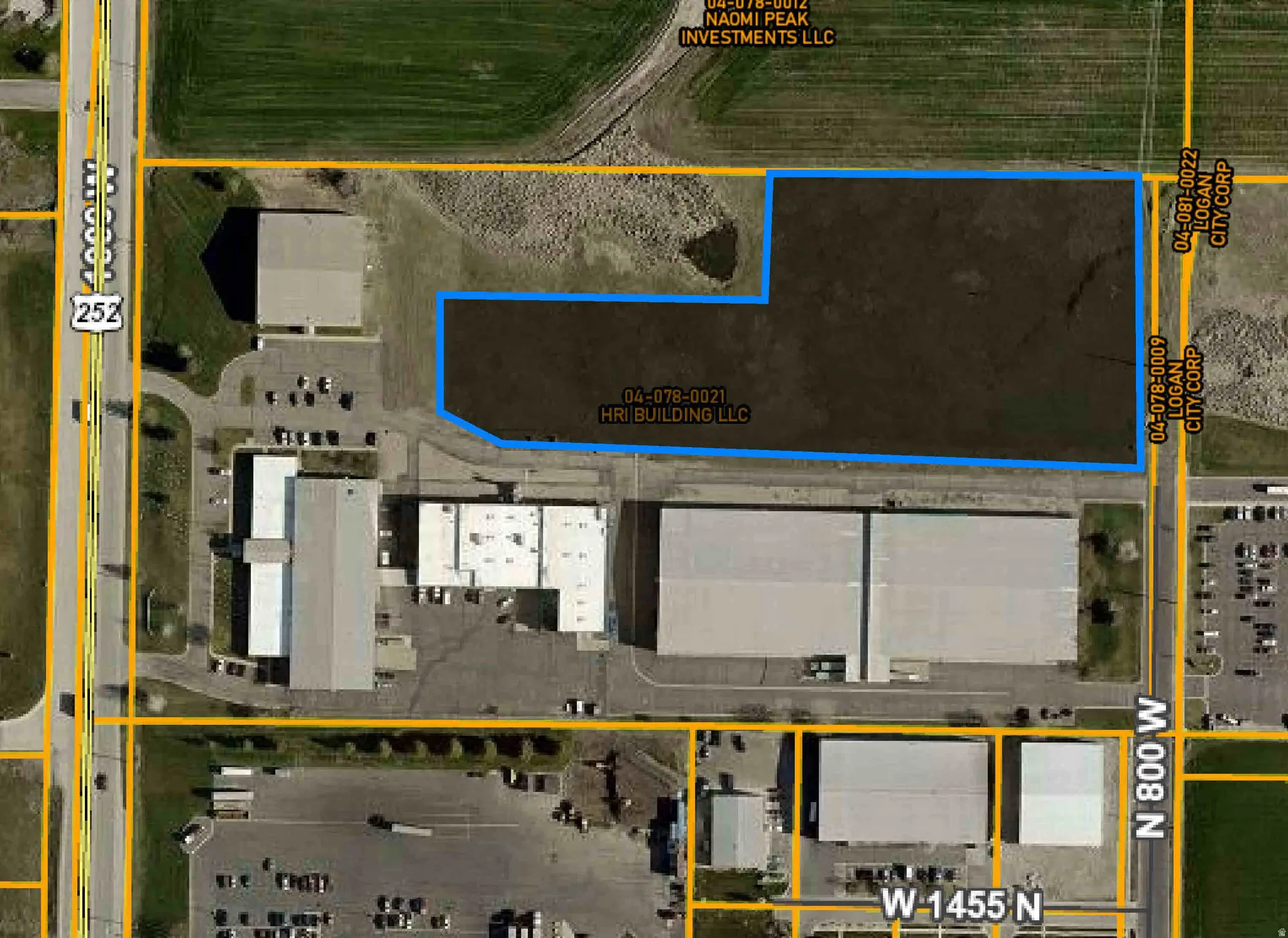 Aerial view of property's location featuring property parcel outlined