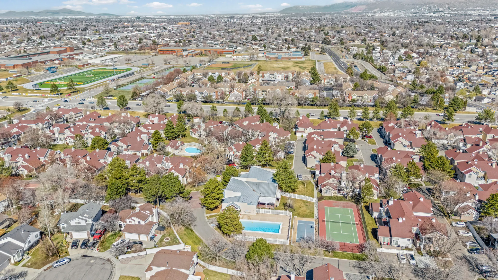 View of property location with nearby suburban area and a mountainous background